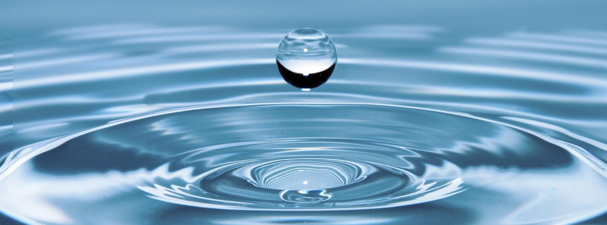 Water ripple with a splash back