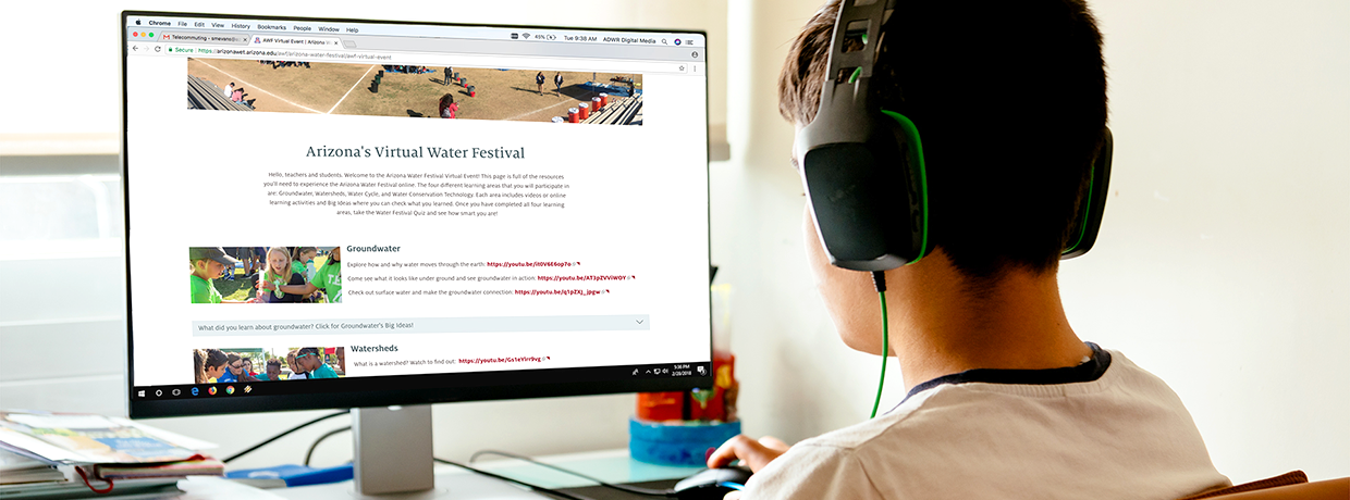 Kid on computer looking at Arizona Department of Water Resources