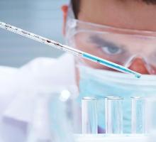 Man in a laboratory testing water 