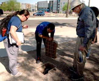 A routine inspection of an irrigation system to check for leaks
